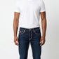 True Religion Dark Indigo Jeans with Dual-Tone White & Red Contrast Stitching.